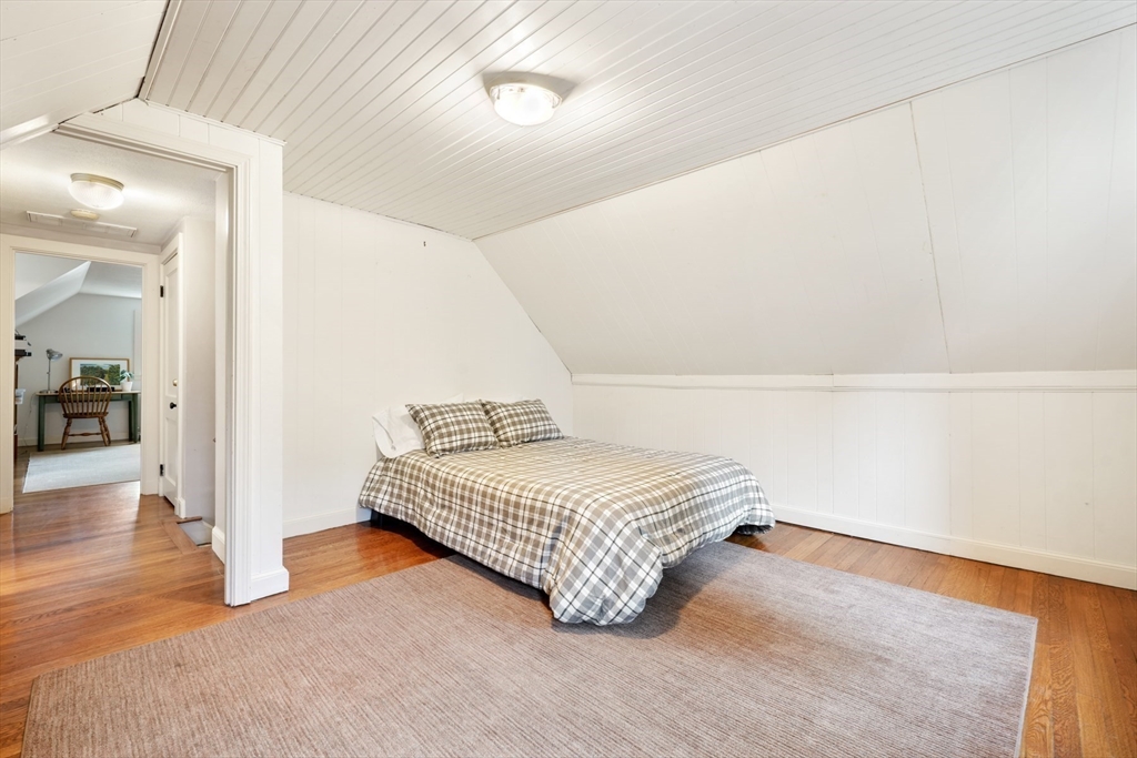 21 Alden Road Wellesley, MA 02481 - Photo 25 of 36 a bedroom with a bed and a view of bathroom