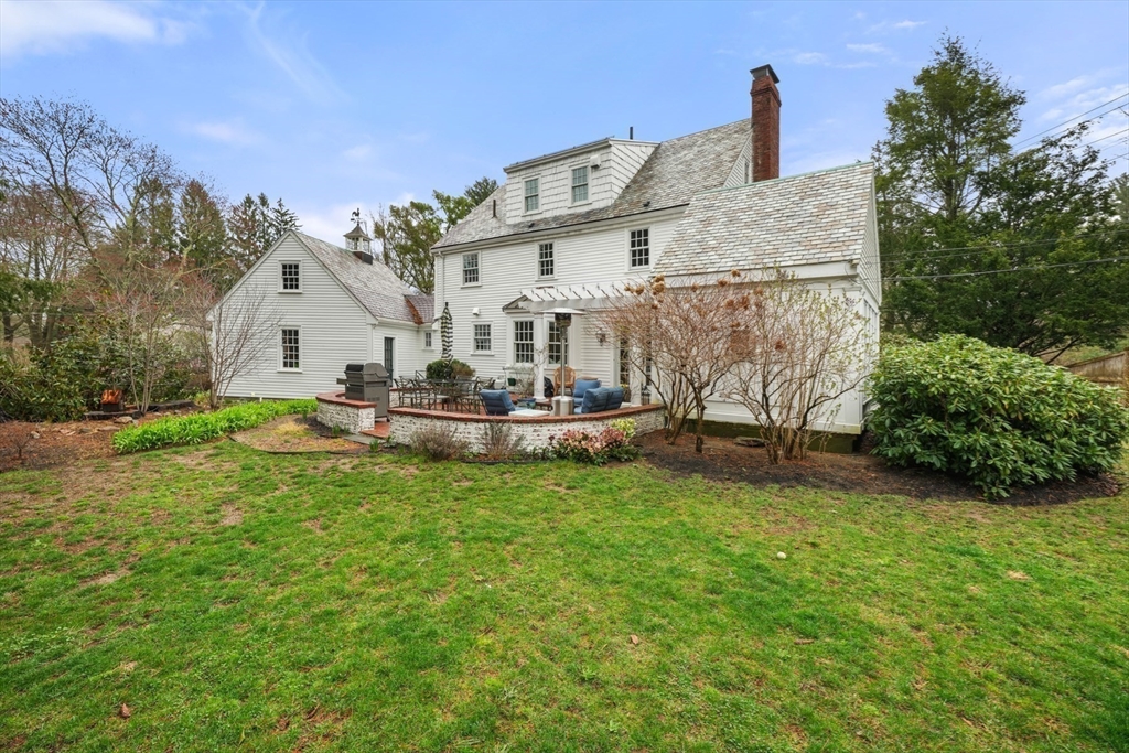 21 Alden Road Wellesley, MA 02481 - Photo 35 of 36 a front view of a house with garden