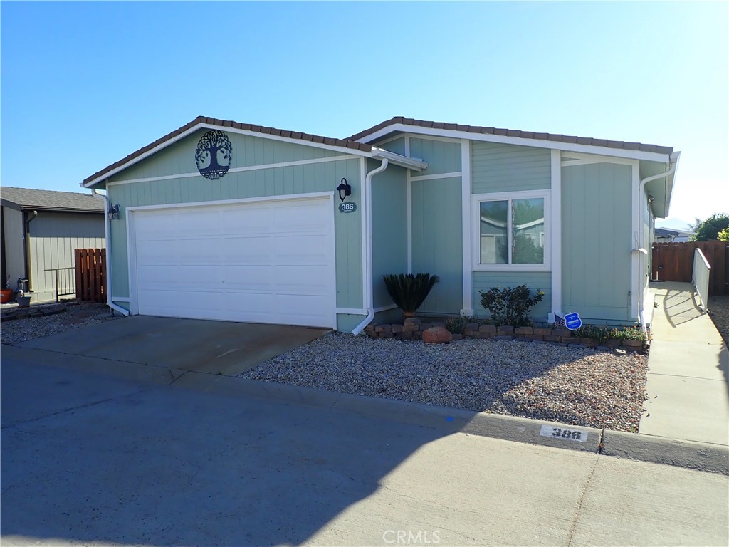 27250 Murrieta Road, Unit 386 Menifee, CA 92586 - Photo 31 of 32 a front view of house with yard