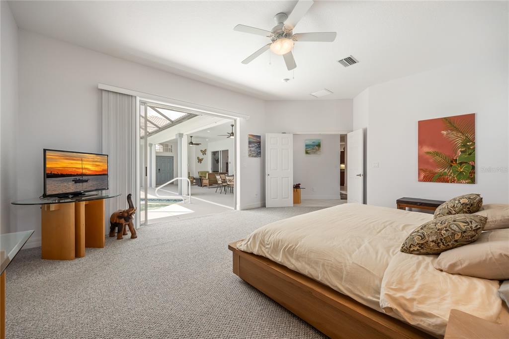 Undisclosed Address Punta Gorda, FL 33955 - Photo 17 of 46 a bedroom with a bed and furniture