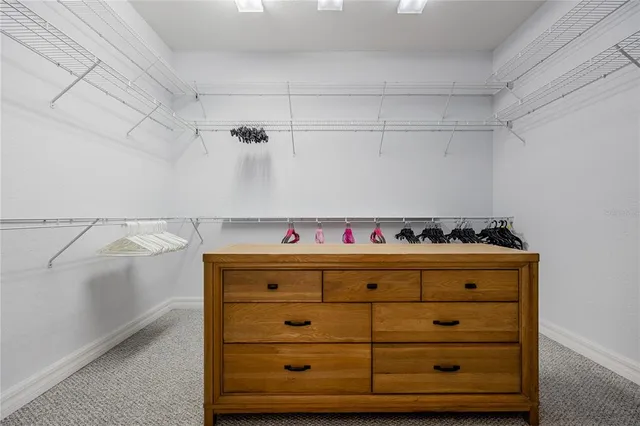 a view of a kitchen with a sink and a cabinets