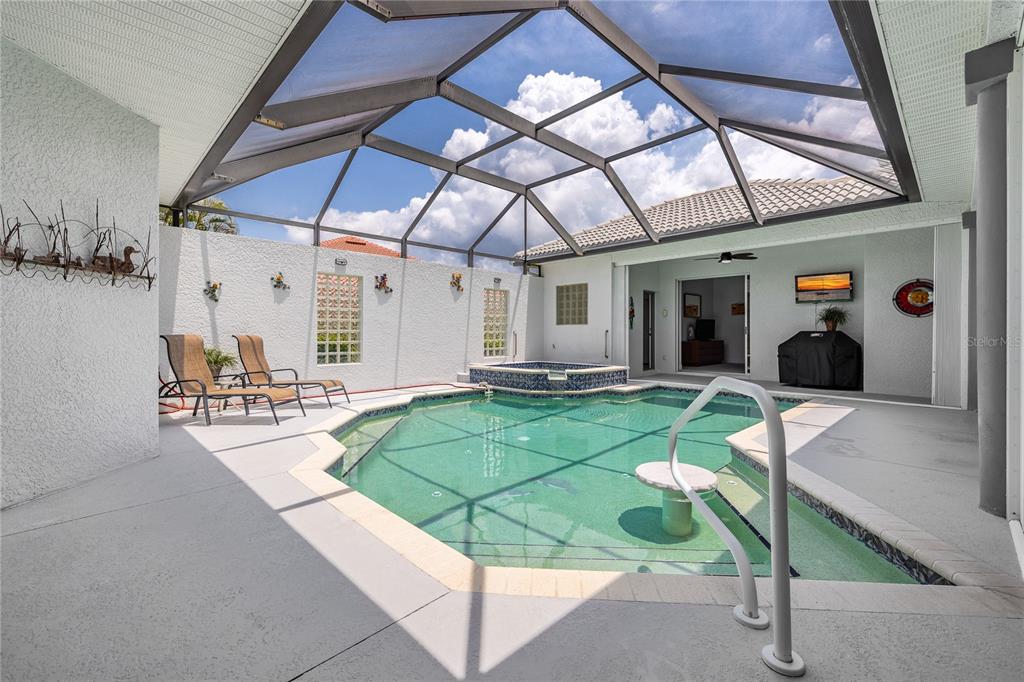 Undisclosed Address Punta Gorda, FL 33955 - Photo 27 of 46 a house with garden in front of it