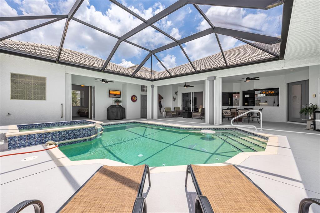 Undisclosed Address Punta Gorda, FL 33955 - Photo 28 of 46 a view of a backyard with swimming pool