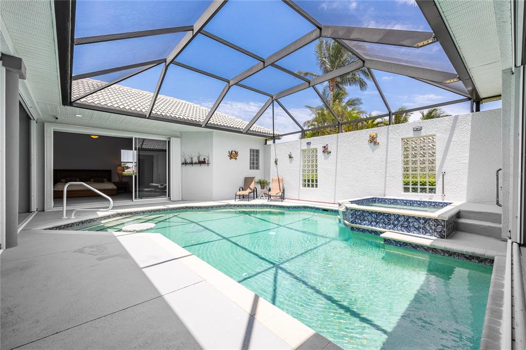 Undisclosed Address Punta Gorda, FL 33955 - Photo 30 of 46 a backyard of a house with yard and outdoor seating