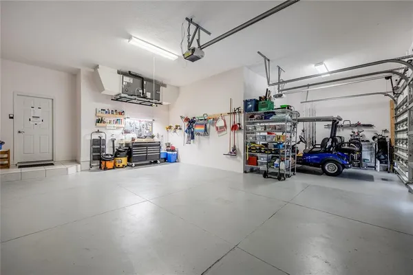 an aerial view of a house with a swimming pool
