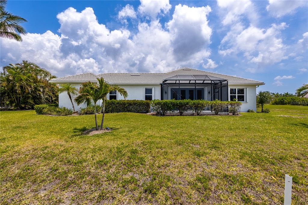 Undisclosed Address Punta Gorda, FL 33955 - Photo 35 of 46 a view of a house with a yard