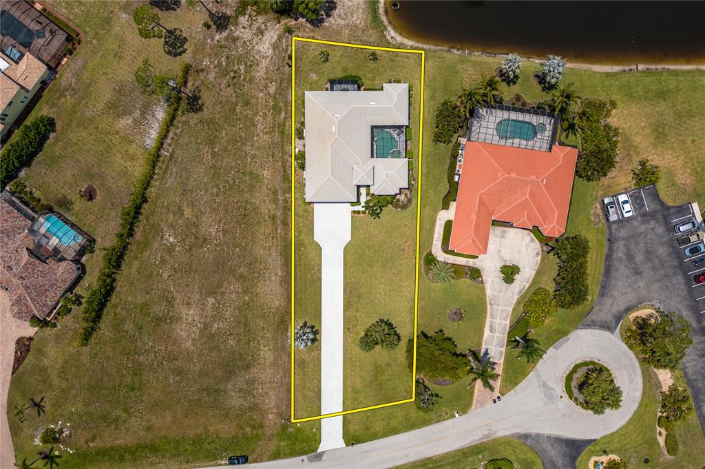 Undisclosed Address Punta Gorda, FL 33955 - Photo 36 of 46 an aerial view of a house with a swimming pool
