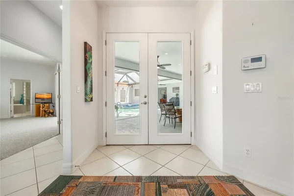 a kitchen with stainless steel appliances a stove microwave and refrigerator