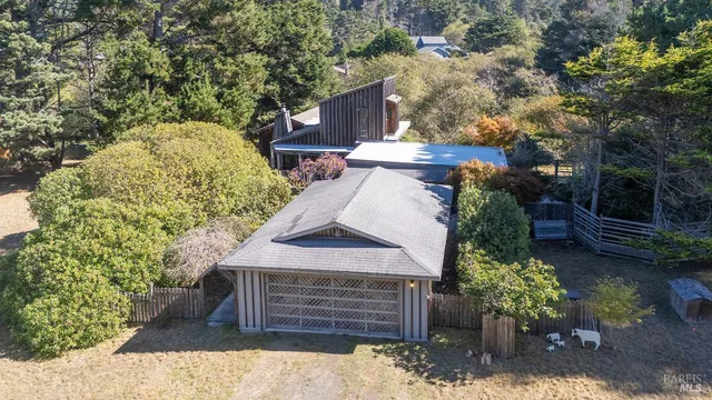 an aerial view of residential house with outdoor space