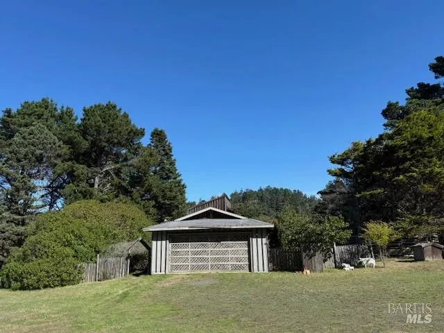 an aerial view of residential house with outdoor space
