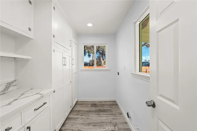 a bathroom with a sink and a window