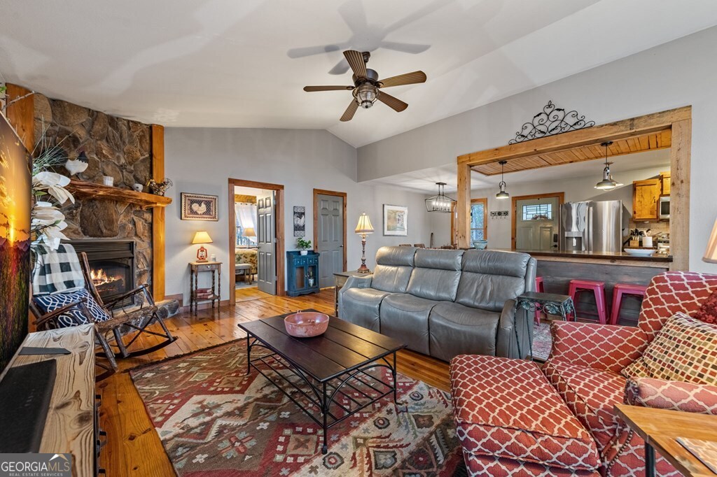 90 Hay Lane Morganton, GA 30560 - Photo 26 of 77 a living room with furniture and a fireplace