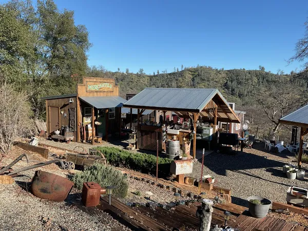 a view of a chair and table in the patio