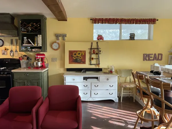 a room with furniture and a flat screen tv