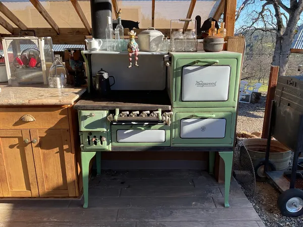 a view of a kitchen with furniture and a kitchen