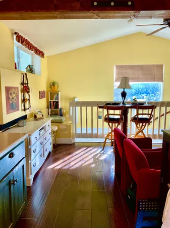a view of a living room and dining room