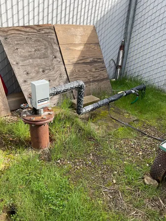 a view of a backyard of the house