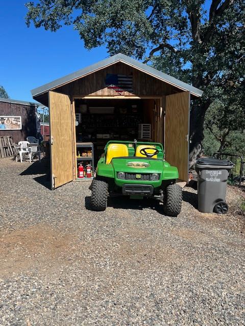 9390 Platina Road Igo, CA 96047 - Photo 52 of 52 a view of backyard with barbeque grill and potted plants
