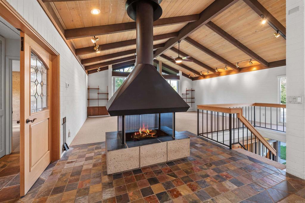 16522 Orchard Bend Road Poway, CA 92064 - Photo 9 of 26 a living room with a couch and a table