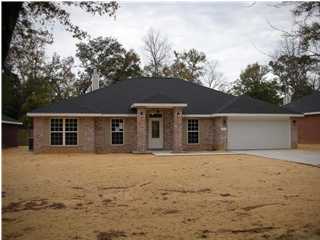 75 Eastern Street Freeport, FL 32439 - Photo 1 of 14 front view of house with a yard