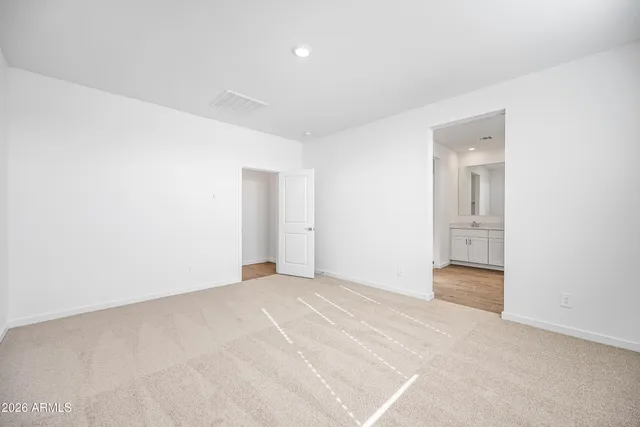 an empty room with an entryway