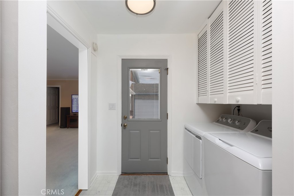 6116 Arbor Road Lakewood, CA 90713 - Photo 15 of 46 a room that has a bed mirror and a window