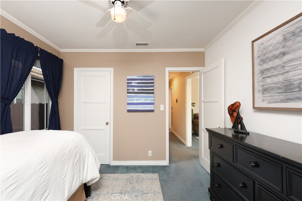 6116 Arbor Road Lakewood, CA 90713 - Photo 20 of 46 a bedroom with a bed and a dresser