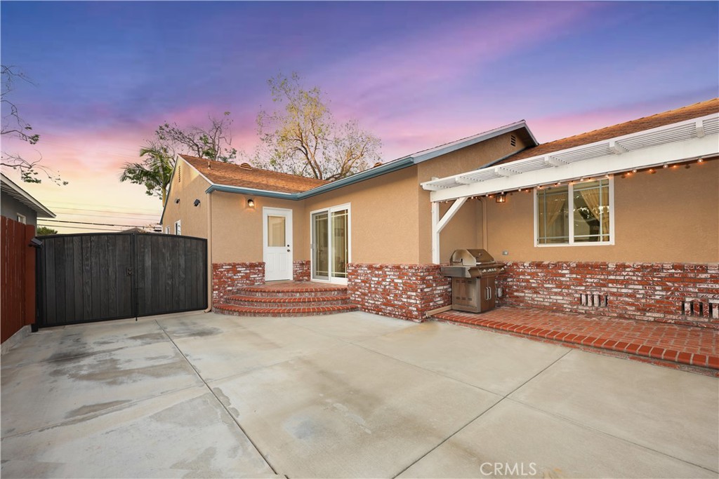 6116 Arbor Road Lakewood, CA 90713 - Photo 34 of 46 a view of a house with a patio