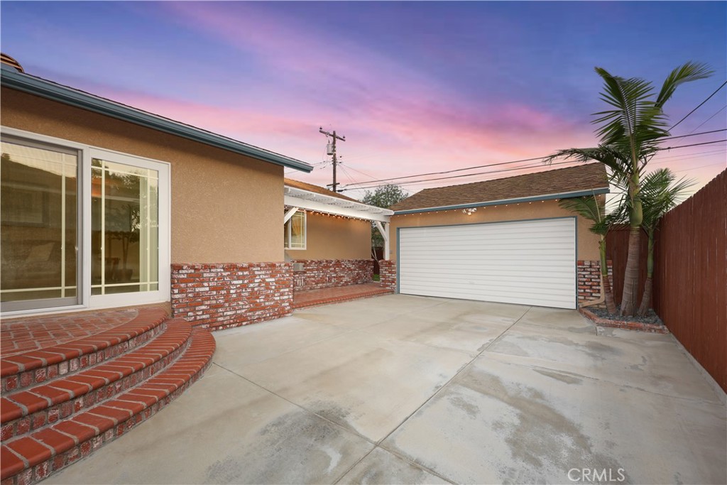 6116 Arbor Road Lakewood, CA 90713 - Photo 35 of 46 a view of a house with a garage