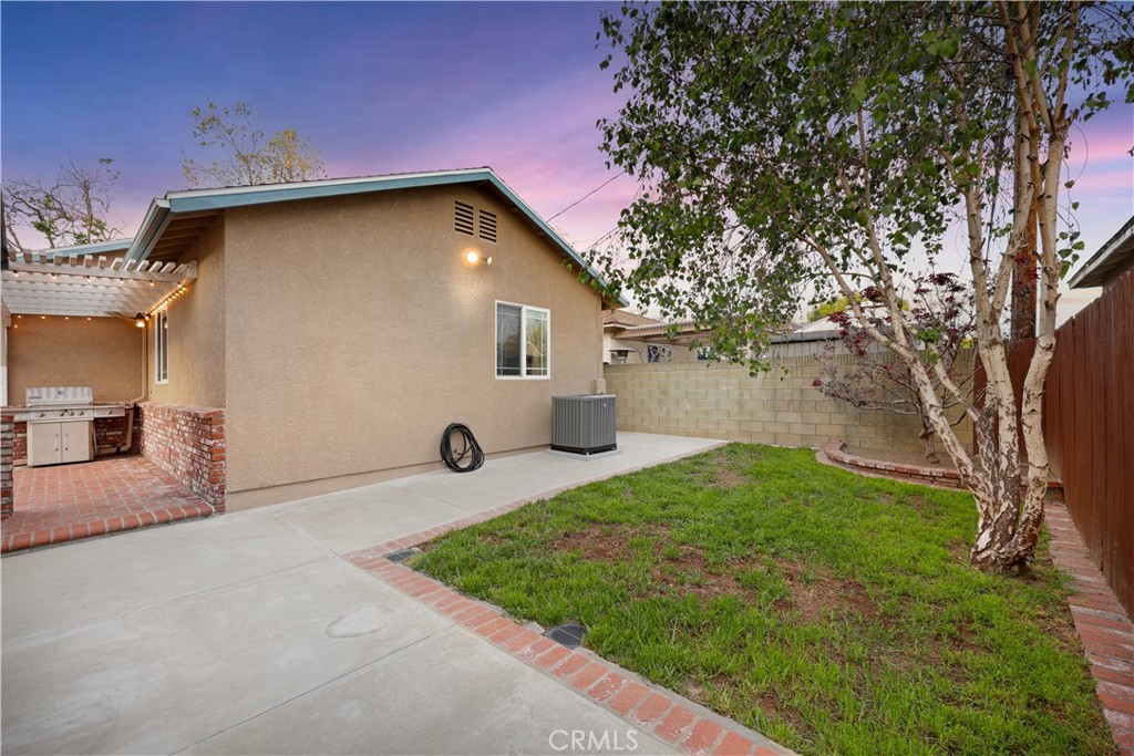 6116 Arbor Road Lakewood, CA 90713 - Photo 39 of 46 a view of a back yard of the house