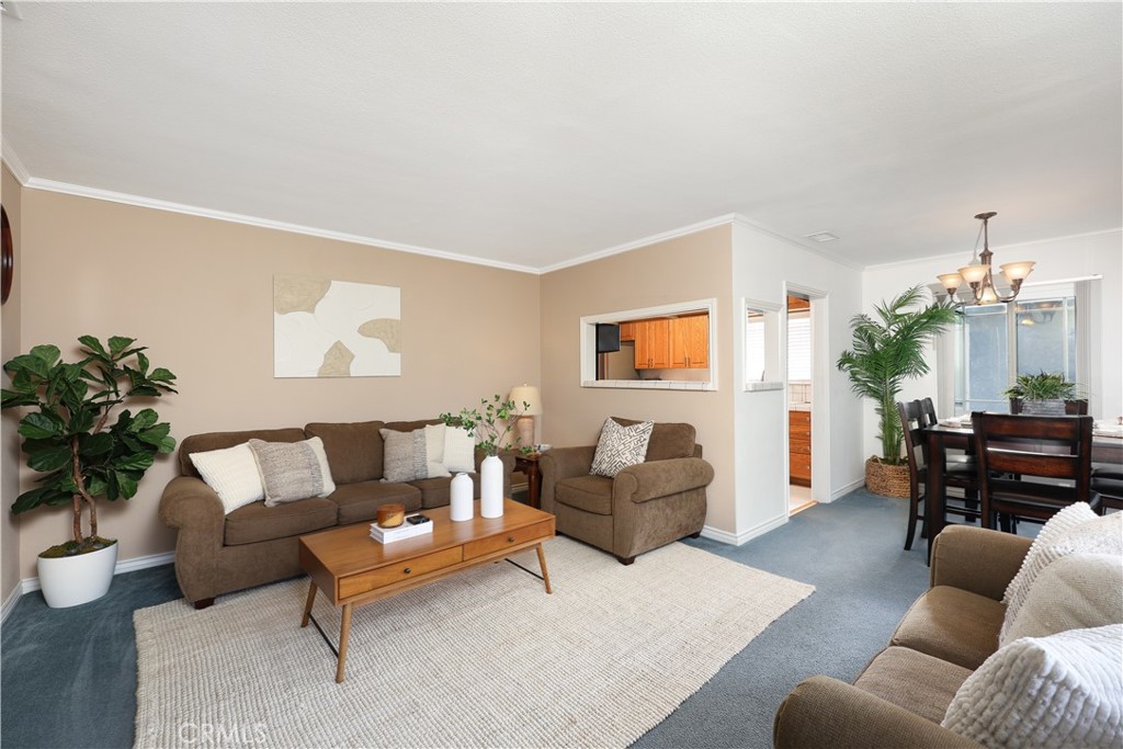 6116 Arbor Road Lakewood, CA 90713 - Photo 5 of 46 a living room with furniture and wooden floor