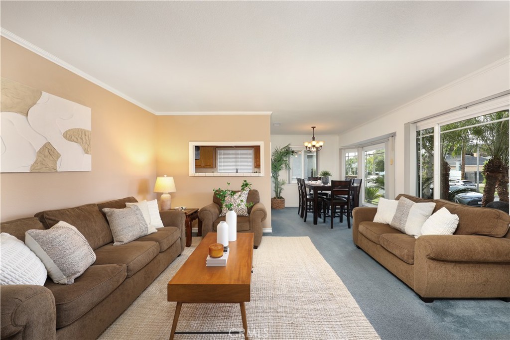 6116 Arbor Road Lakewood, CA 90713 - Photo 7 of 46 a living room with furniture and a large window
