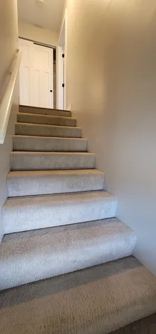 a view of a bathroom with a glass door