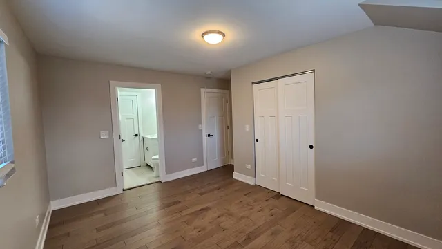 wooden floor with staircase