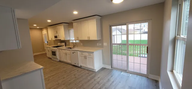 a bathroom with a toilet and a sink
