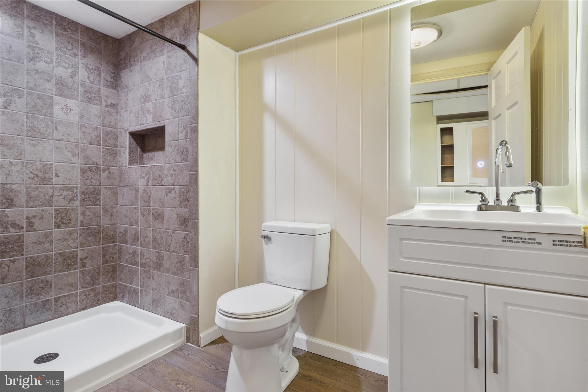 263 Bowling Green Road Front Royal, VA 22630 - Photo 36 of 75 a bathroom with a sink a toilet and shower