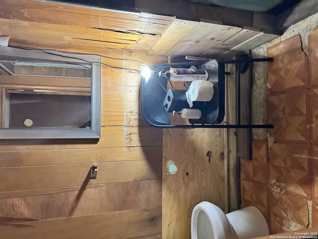 a bathroom with a bathtub and shower