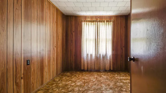 a view of a bathroom with a sink and a shower curtain