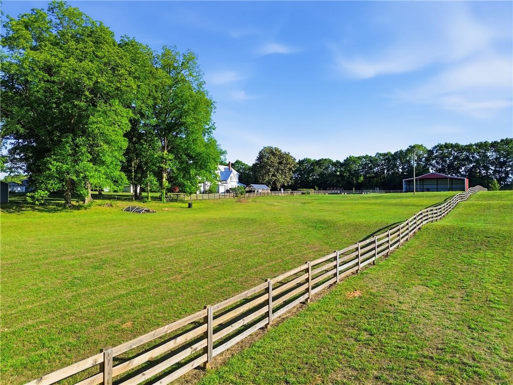 880 Johnstonville Road Barnesville, GA 30204 - Photo 3 of 33 a view of a field with an outdoor space