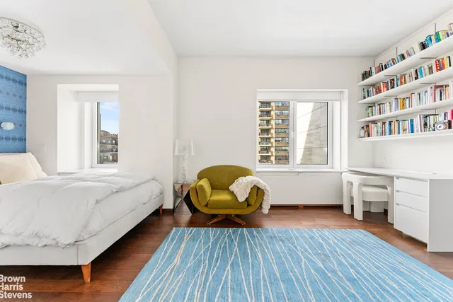 a bathroom with a toilet a sink and bathtub