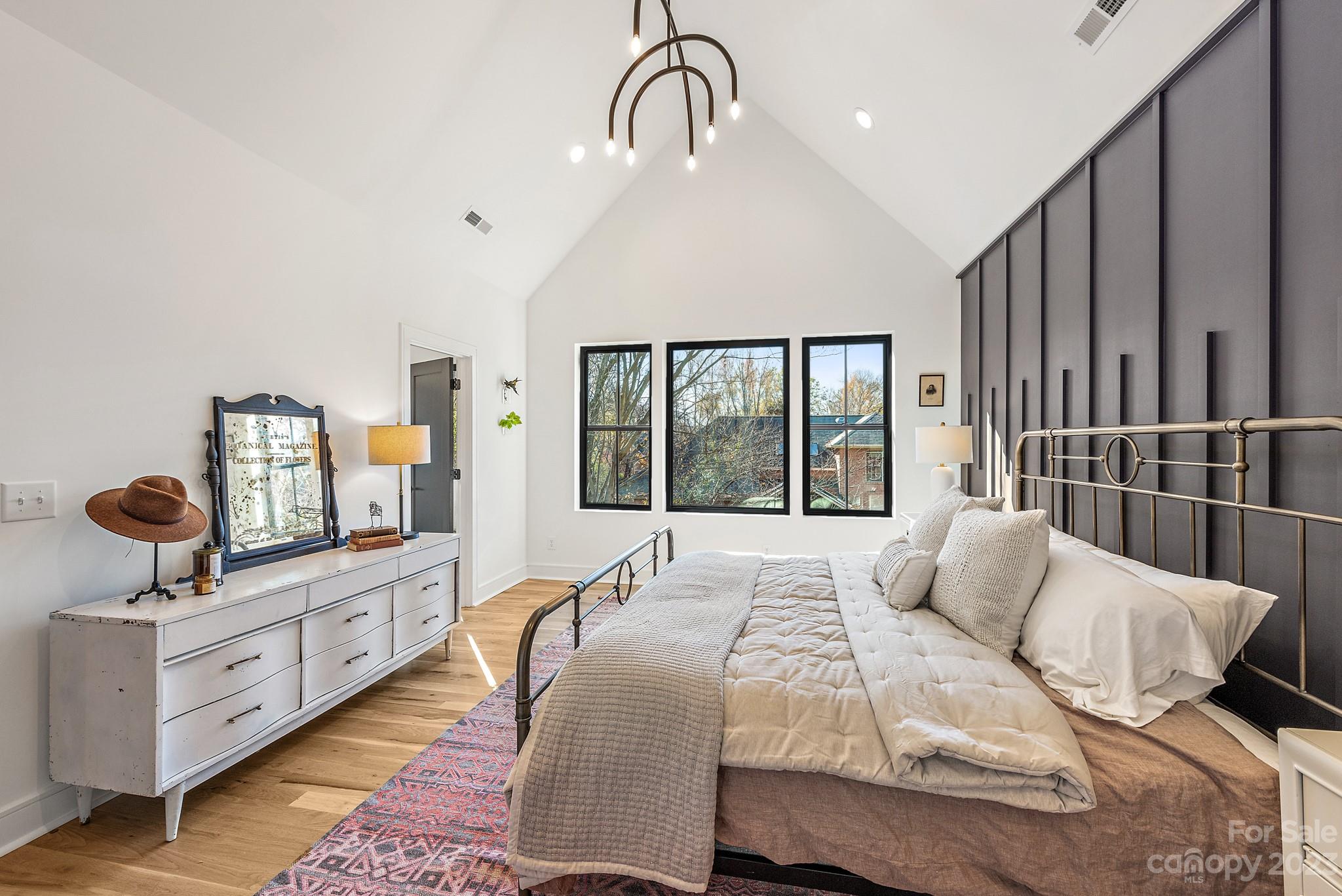 4338 Castleton Road Charlotte, NC 28211 - Photo 16 of 38 a bedroom with furniture and a window