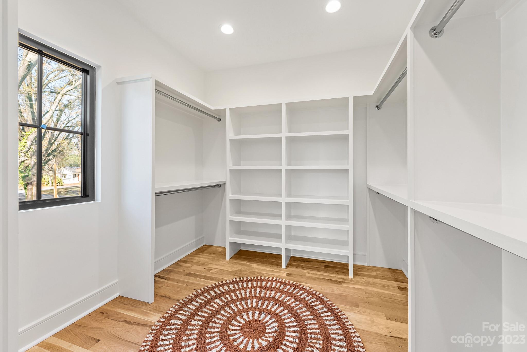 4338 Castleton Road Charlotte, NC 28211 - Photo 21 of 38 a room with a bed and a window