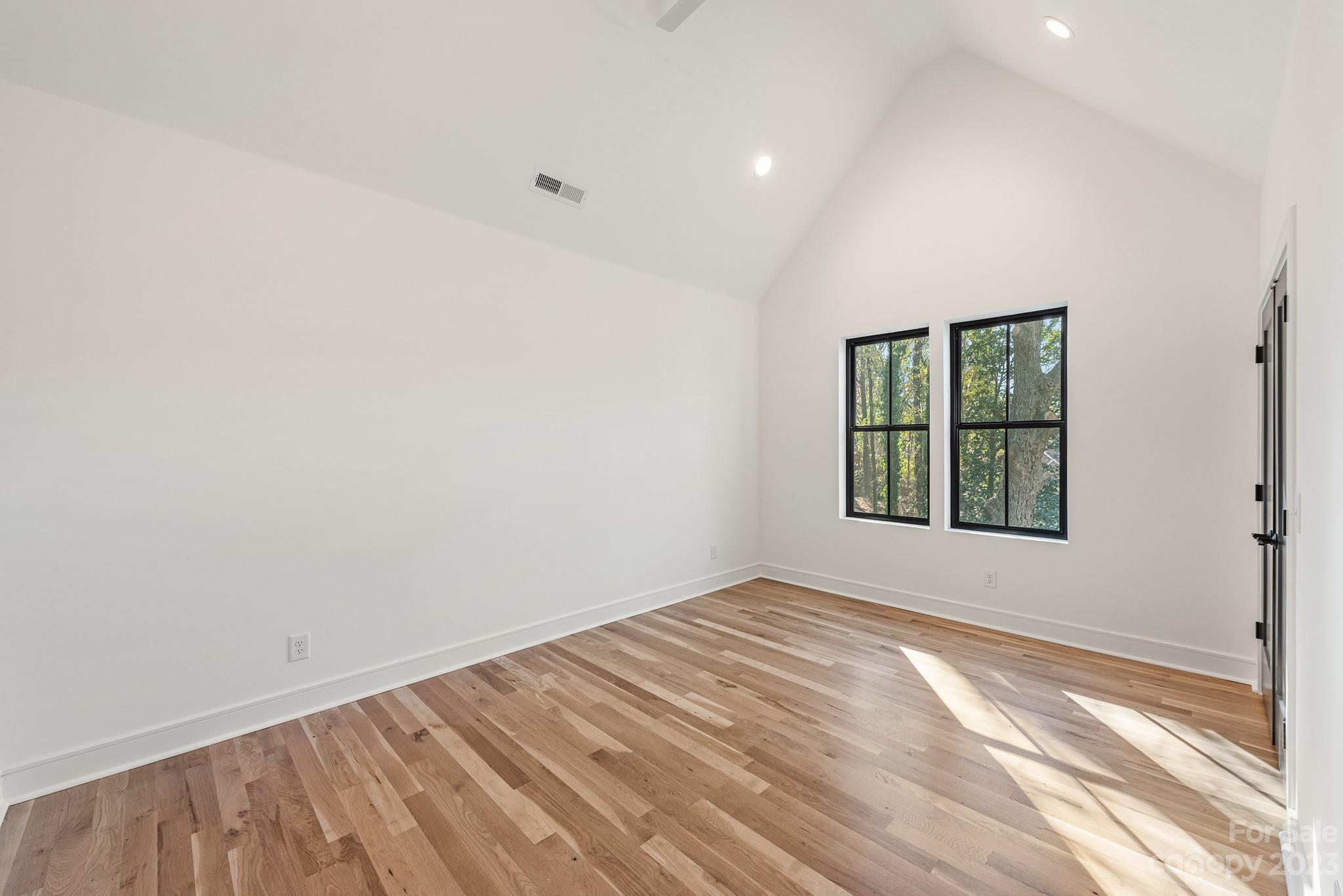 4338 Castleton Road Charlotte, NC 28211 - Photo 24 of 38 an empty room with windows