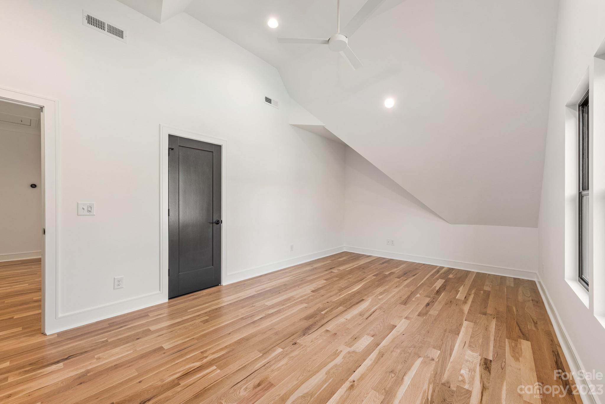 4338 Castleton Road Charlotte, NC 28211 - Photo 26 of 38 a view of empty room with wooden floor