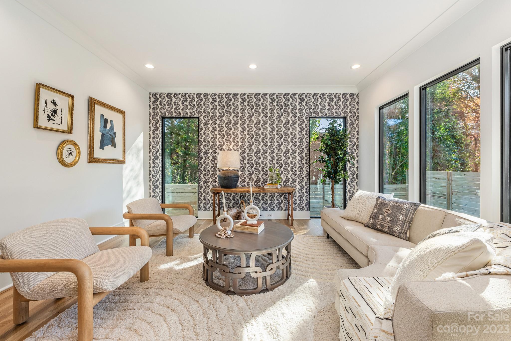 4338 Castleton Road Charlotte, NC 28211 - Photo 3 of 38 a living room with furniture and a large window