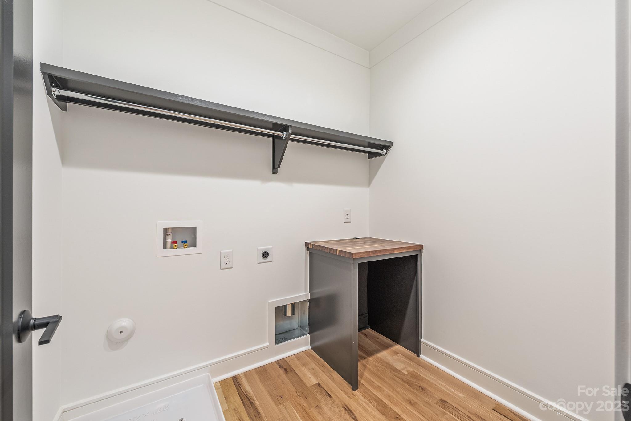 4338 Castleton Road Charlotte, NC 28211 - Photo 32 of 38 a view of a room with rack on the wall