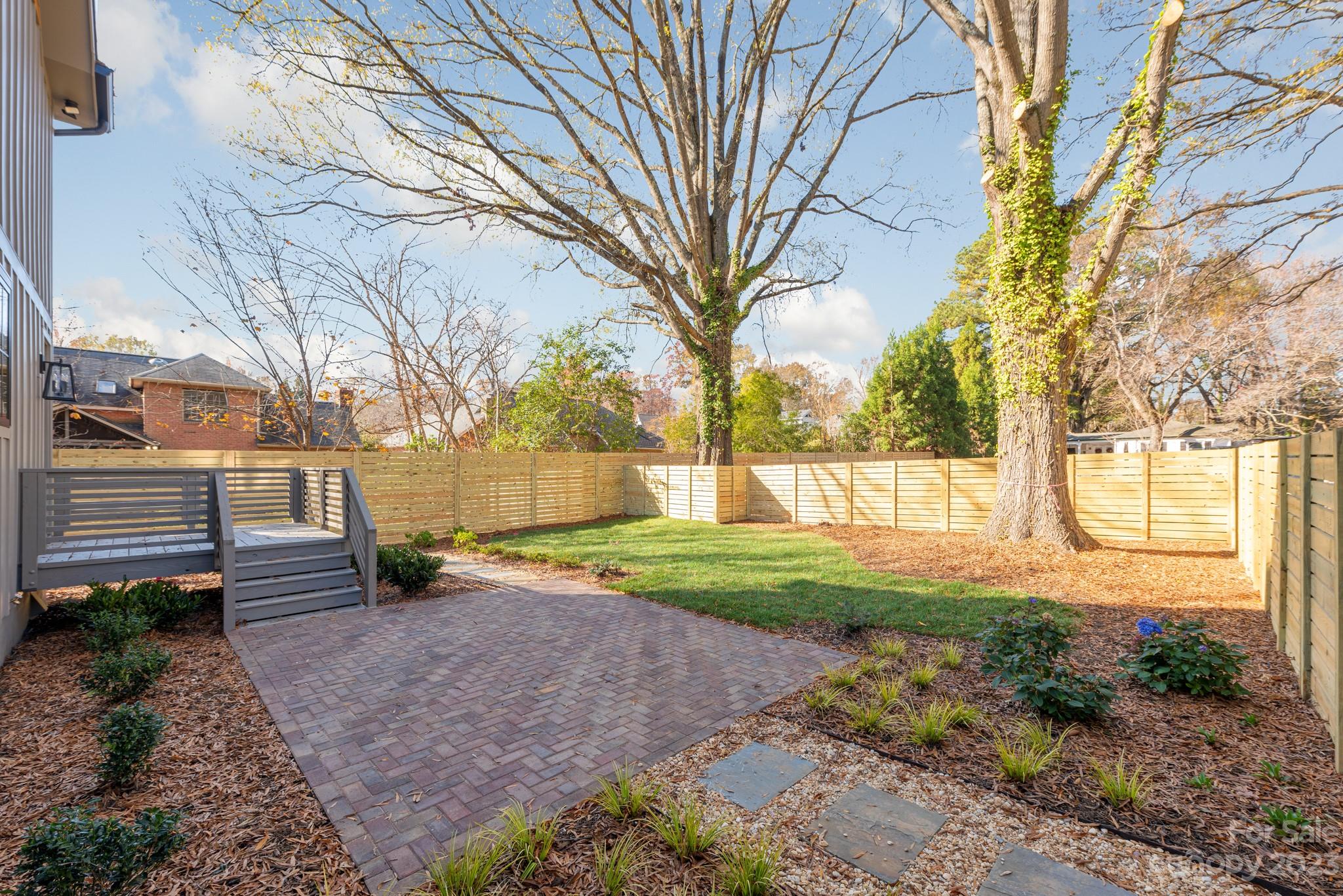 4338 Castleton Road Charlotte, NC 28211 - Photo 38 of 38 a view of a backyard with large tree