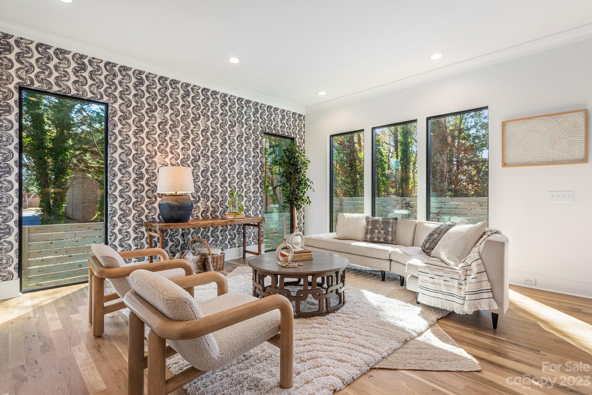 4338 Castleton Road Charlotte, NC 28211 - Photo 4 of 38 a living room with furniture and a large window