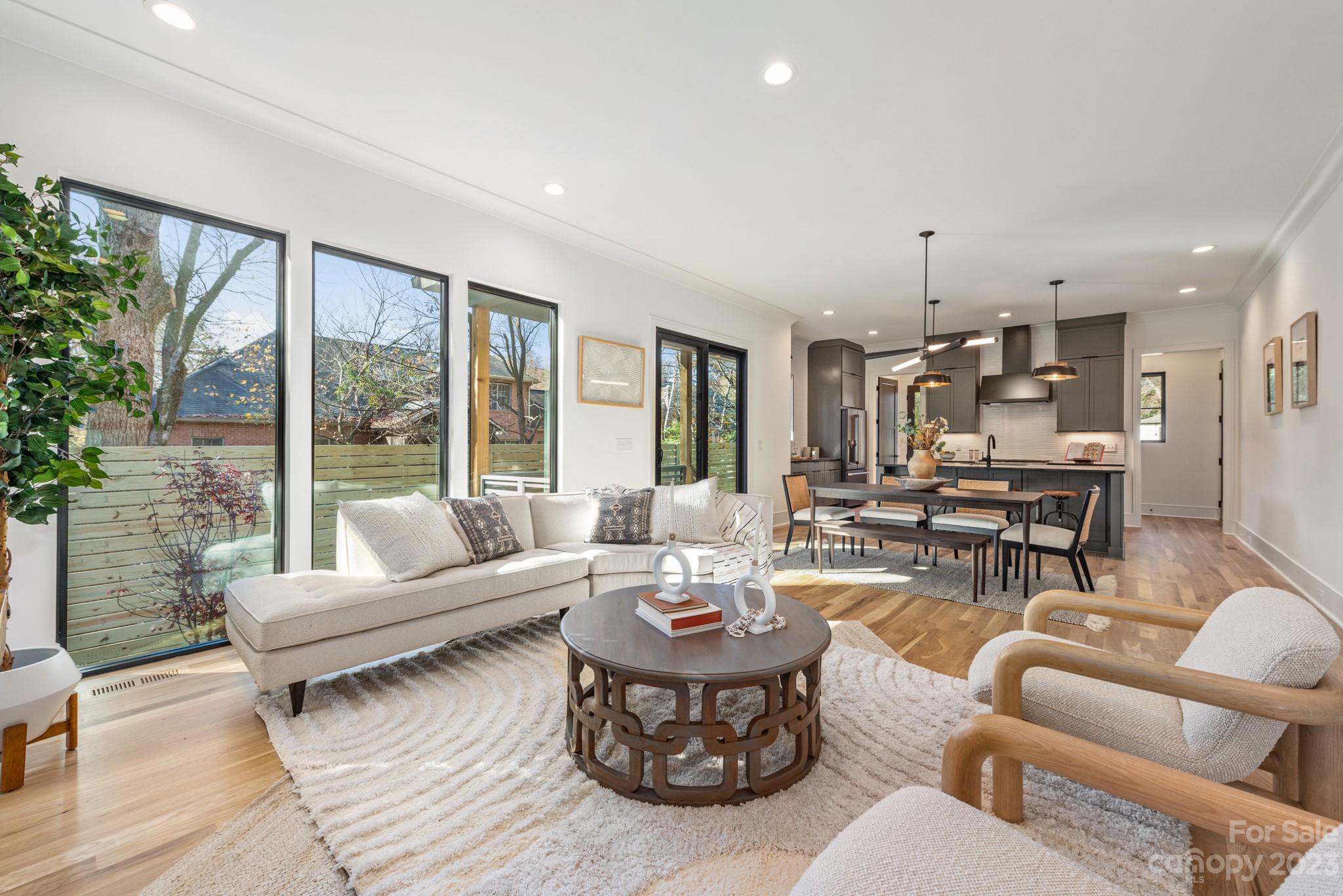 4338 Castleton Road Charlotte, NC 28211 - Photo 5 of 38 a living room with furniture and a large window