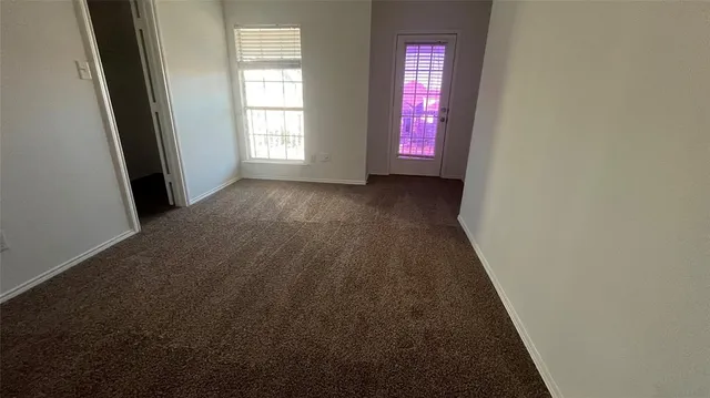 a view of a livingroom with a window